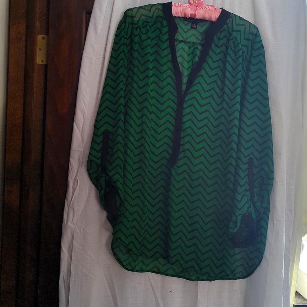 Tunic length, rear pleat, long sleeves